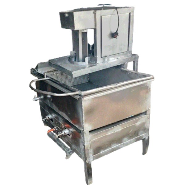 Slicer on top of deep fryer for plantain chips production
